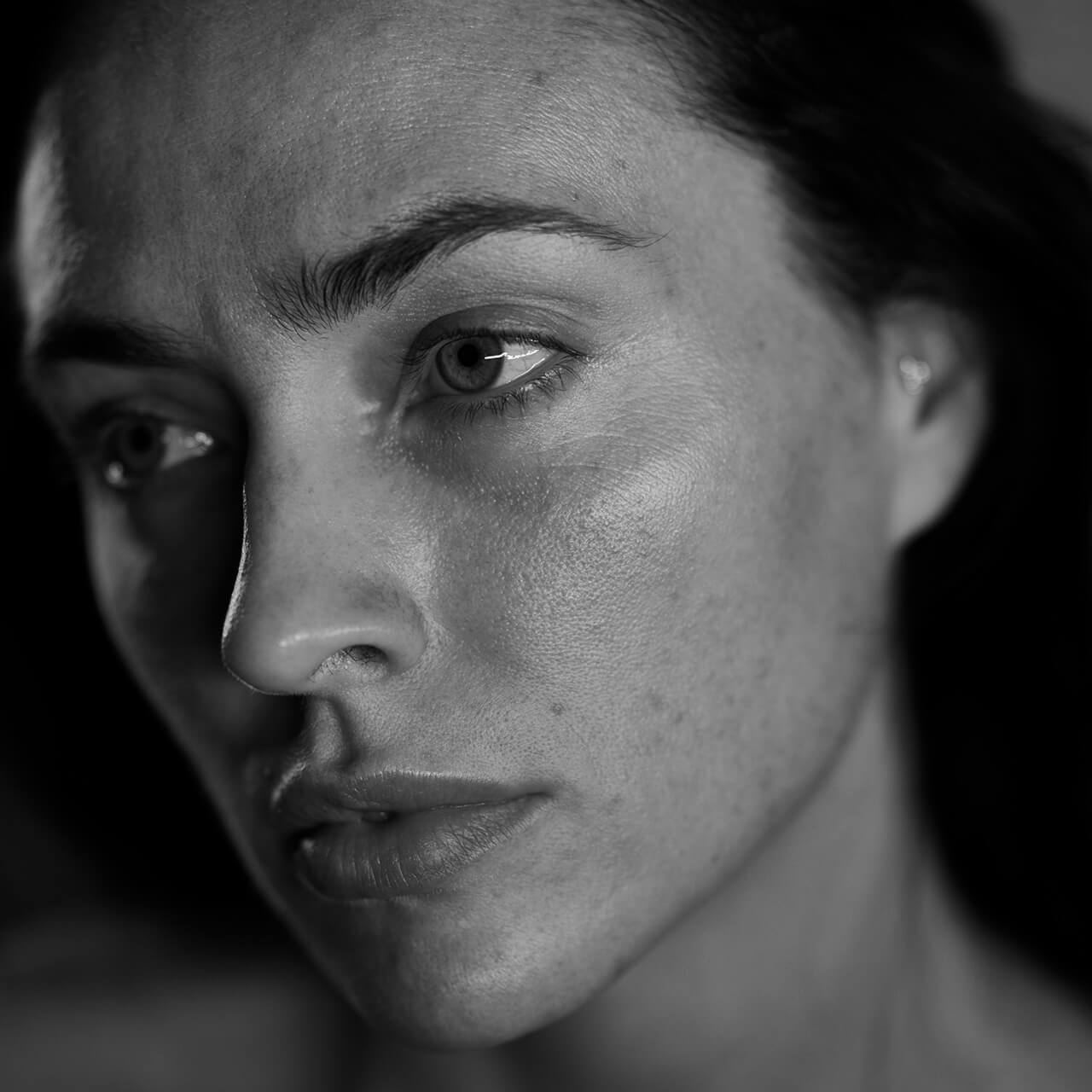 Before: Black-and-white close-up portrait of a woman’s face